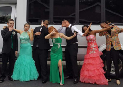 Prom Group in front of Party Bus