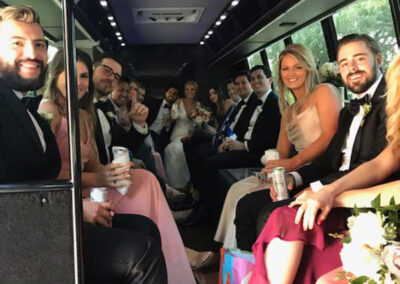 Wedding group arriving by bus